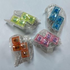 BRELOK ANTYSTRESOWY LED FIDGET KEYBOARD.