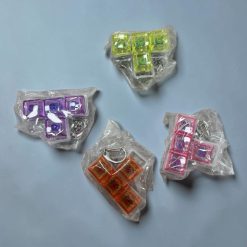 BRELOK ANTYSTRESOWY LED FIDGET KEYBOARD.