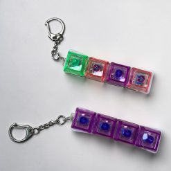 BRELOK ANTYSTRESOWY LED FIDGET KEYBOARD.