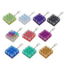 BRELOK ANTYSTRESOWY LED FIDGET KEYBOARD.
