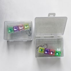 BRELOK ANTYSTRESOWY LED FIDGET KEYBOARD.