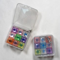 BRELOK ANTYSTRESOWY LED FIDGET KEYBOARD.