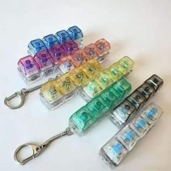 BRELOK ANTYSTRESOWY LED FIDGET KEYBOARD.