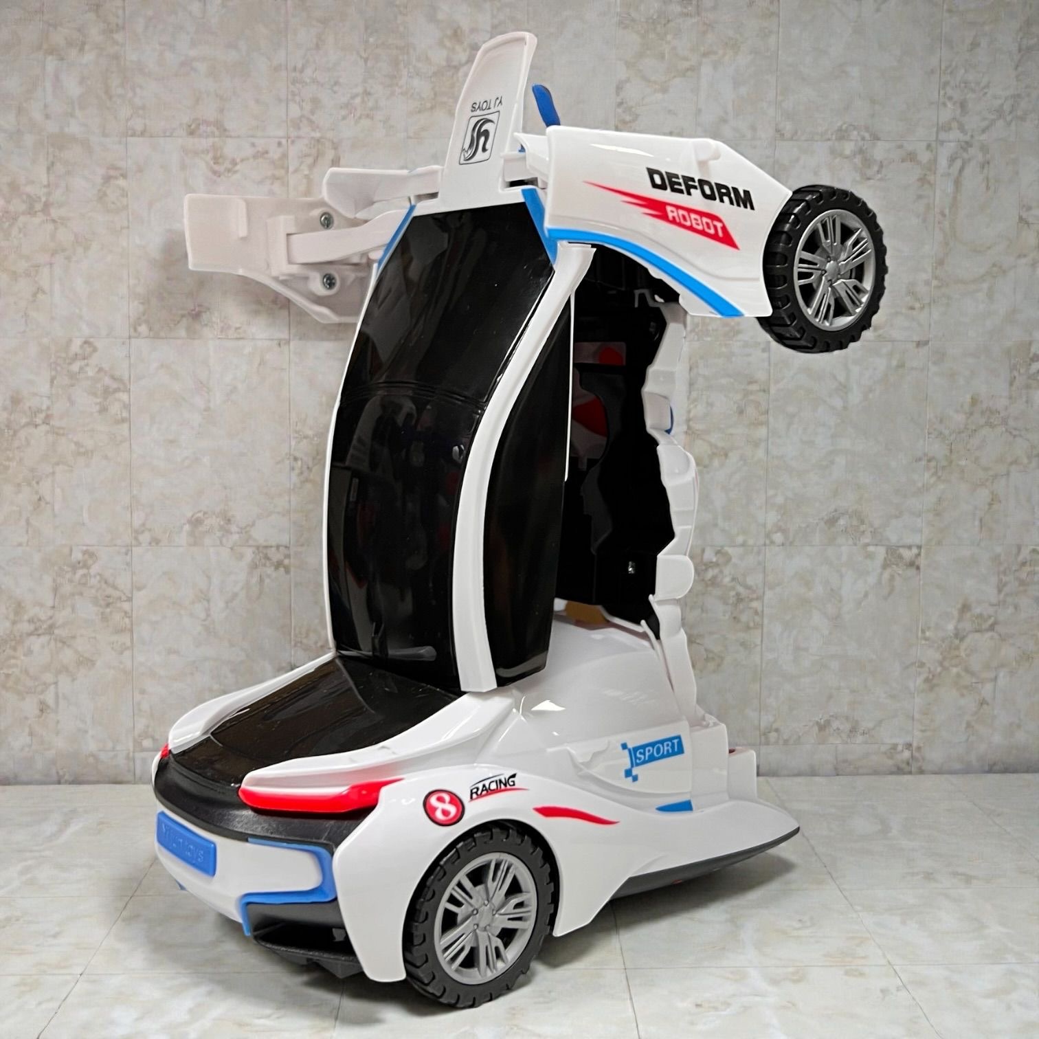 AUTO TRANSFORMUJĄCY ROBOT 2W1 JEŹDZIK DŹWIĘKI LED.