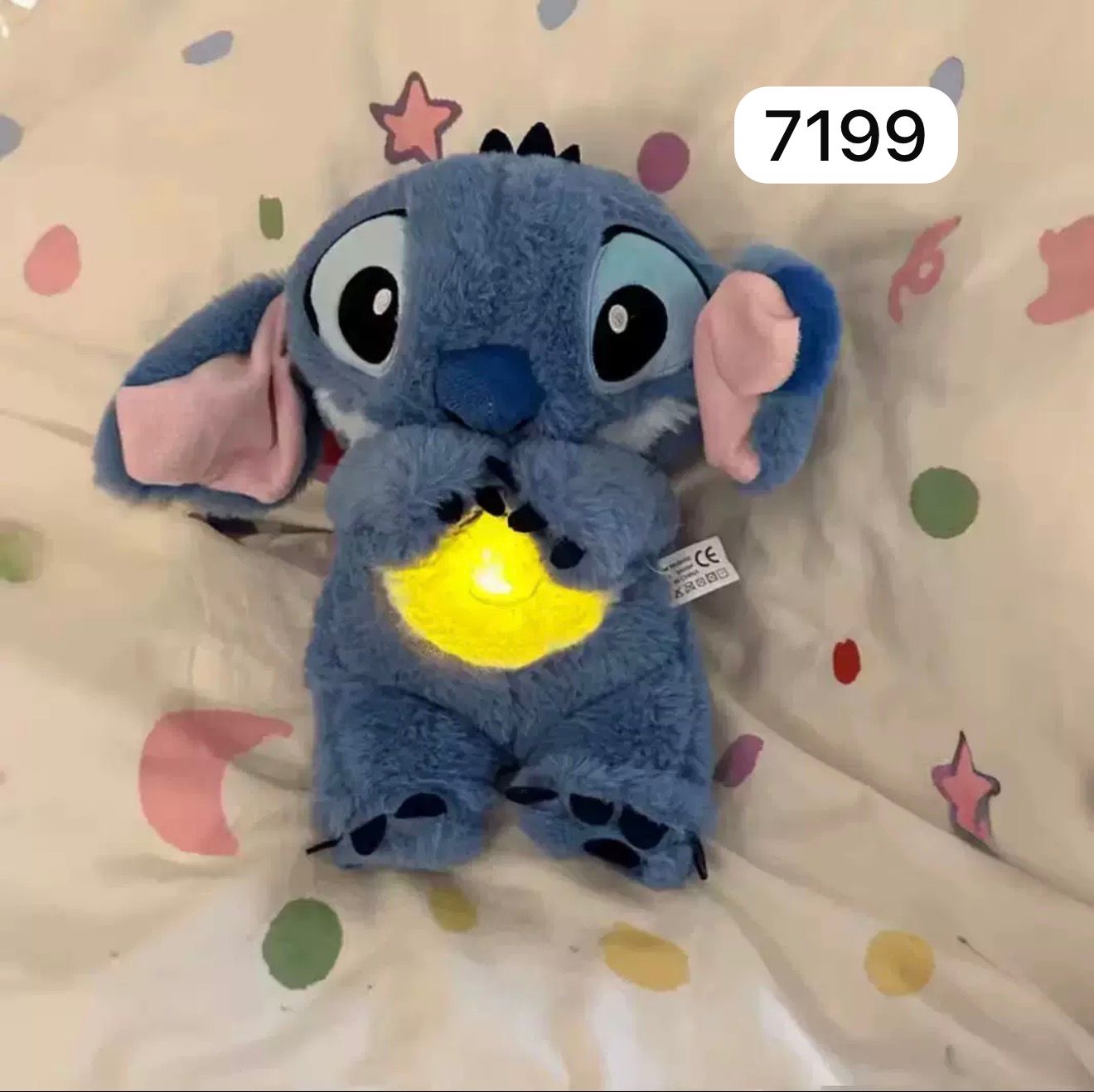 MASKOTKA STITCH ODDYCHAJĄCA NIEBIESKI DLA DZIECI.